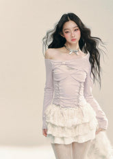 비대칭 레이스 트림 니트 탑